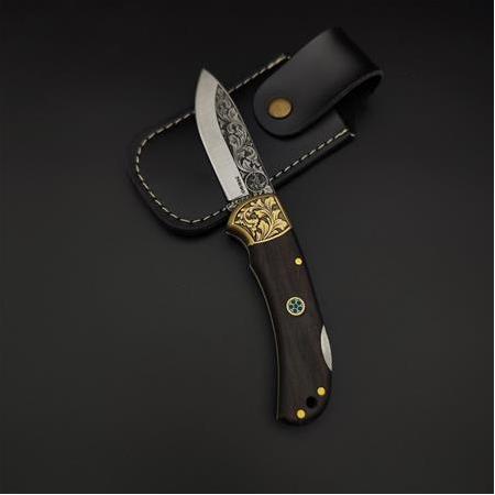 El yapımı N690 çelik üzerine gravür işlemeli kamp çakısı